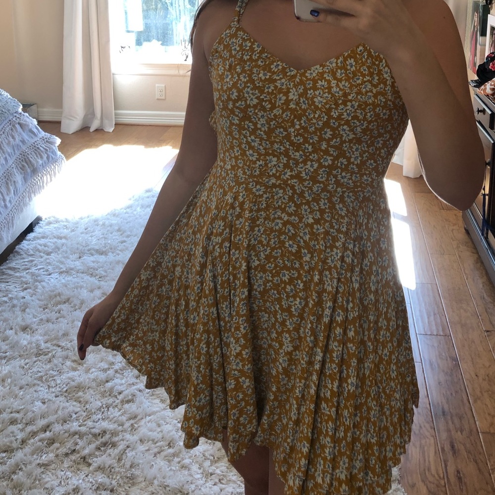 Crossed back dainty mustard colored floral dress